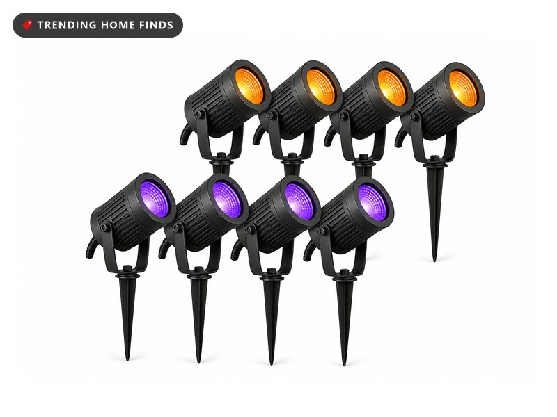 Eight black die cast aluminum spike spotlights with glowing lenses and short low voltage cables.