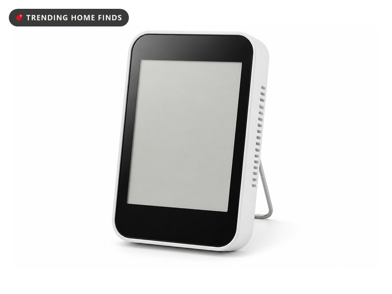 White Temtop air quality monitor showing CO2 in ppm with temperature and humidity readings
