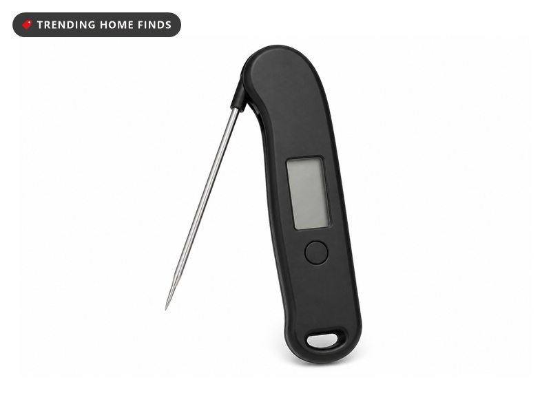 Black ThermoPro digital meat thermometer with its probe folded out and a lit display reading 165.9 degrees Fahrenheit