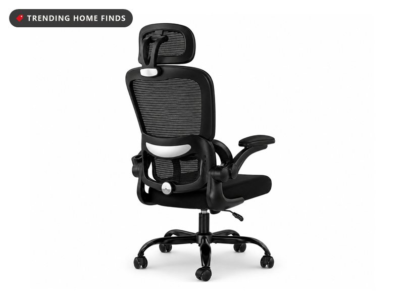 Black mesh ergonomic office chair with a headrest and flip-up armrests