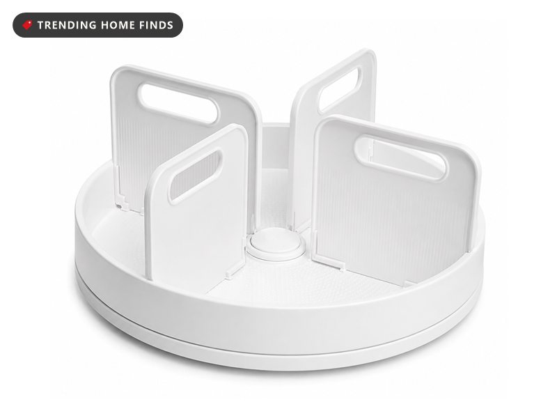 White under-sink turntable with four adjustable upright dividers and carry handles moulded into the base