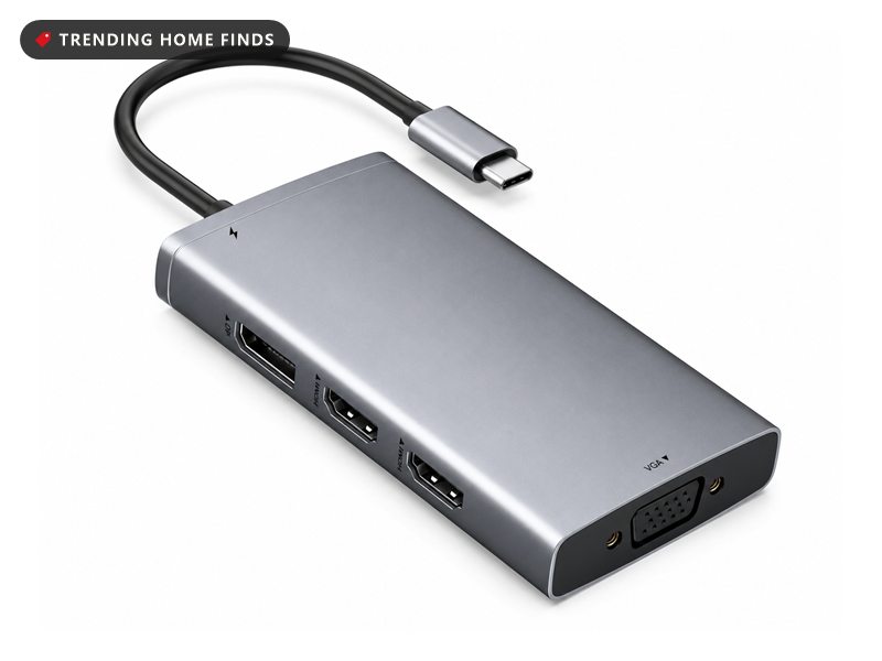 Gray USB-C docking station with HDMI, DisplayPort, VGA and USB ports and a built-in USB-C cable