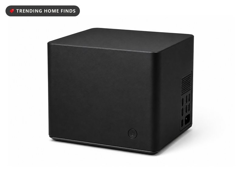 Small cube-shaped compact gaming PC console, on a white background