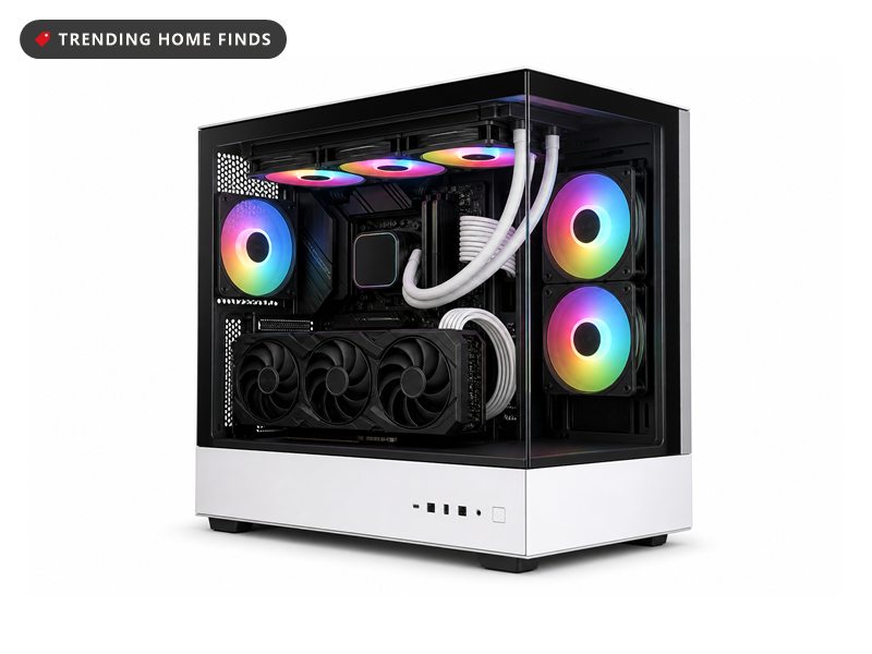 White Velztorm desktop tower with a wraparound glass front, three rainbow-lit fans across the top, two more down the side, a lit memory row and a graphics card whose shroud reads GEFORCE RTX and VELZTORM