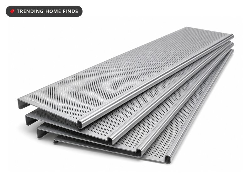 Stack of silver aluminium gutter guard panels, each a shallow perforated channel with a folded lip along one edge.