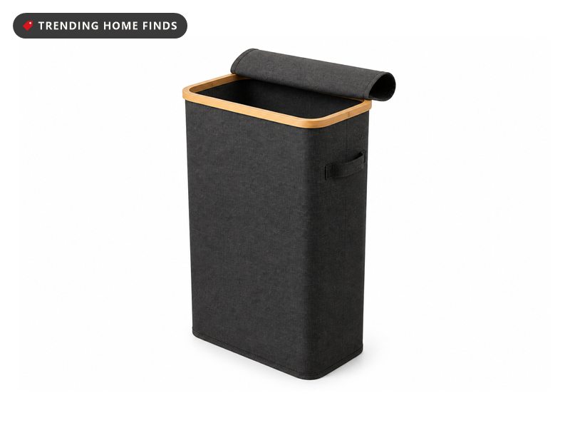 A slim black fabric laundry hamper with a light wood rim and a matching fabric lid, standing upright.