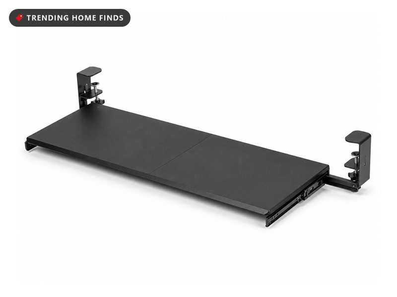 Black under-desk keyboard tray on steel slide rails with two clamps at the ends, on a white background