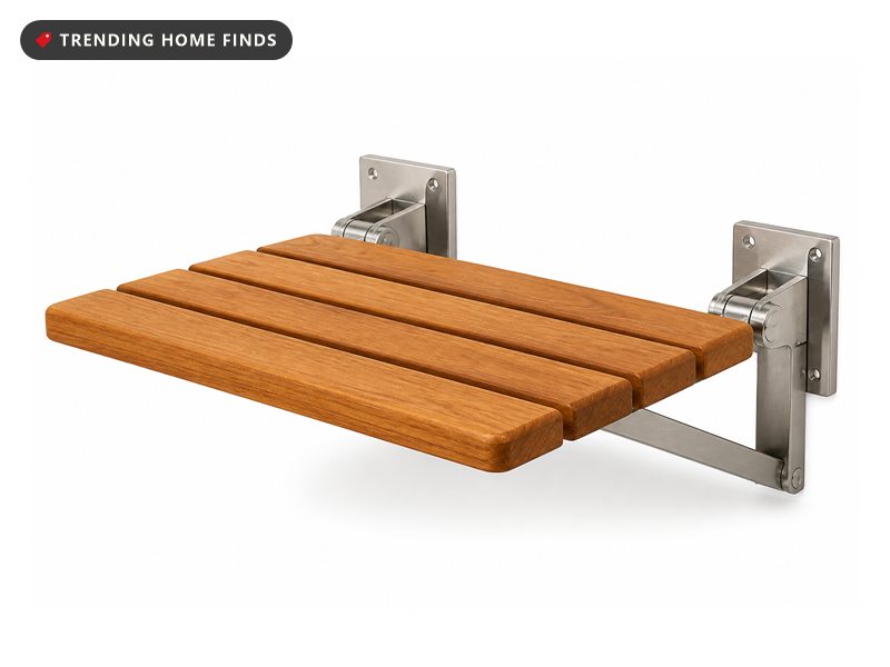 Wall-mounted teak fold-down shower bench on steel brackets, on a white background