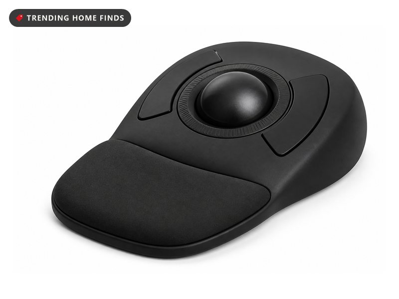 Black wireless trackball mouse with a large ball, scroll ring and detachable wrist rest, shown at an angle.