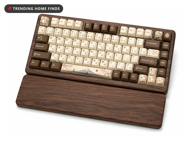 Mechanical keyboard in a walnut wood shell with cream and brown keycaps and a matching wooden wrist rest in front