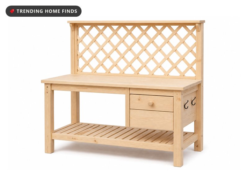 A natural fir potting bench with a diamond lattice back, a cabinet drawer and a lower shelf.