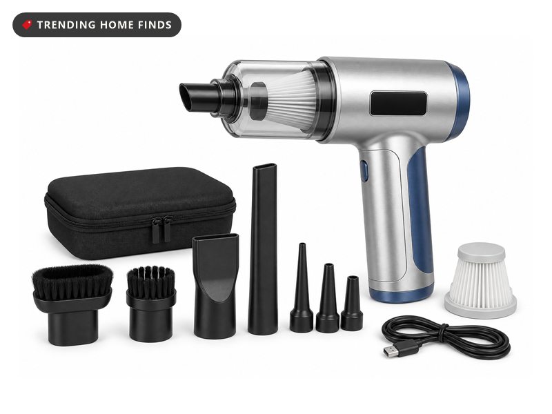 Silver handheld cordless vacuum with a clear dust cup, shown with a carry case and nozzle attachments